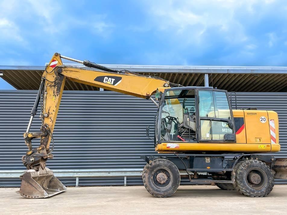 Excavator pe roti - CAT M318F