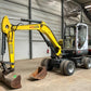 Excavator pe roti - Neuson 6503 WD